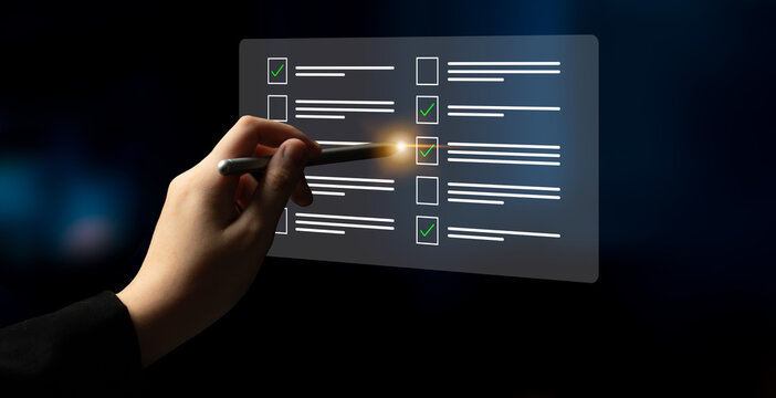 A hand uses a pen to mark items on a digital checklist with glowing checkmarks, representing efficiency and dedication to task completion in a modern work setting. Cyphers