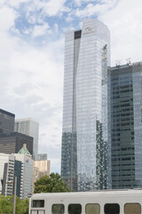 Obraz premium (at left) financial district and cloudy clearing in the sky and view of Delta hotel / Southcore Financial District buildings, Toronto