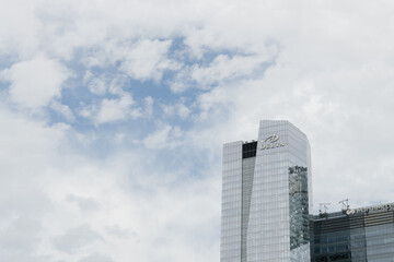 Obraz premium cloudy clearing in the sky and view of Delta hotel / Southcore Financial District buildings, Toronto