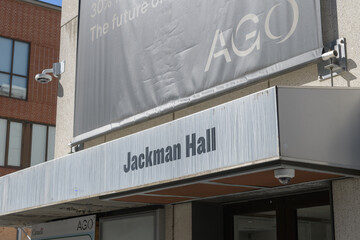 Obraz premium banner signage of Dani Reiss Modern and Contemporary Gallery expansion and 'ghost' sign of Jackman Hall, McCaul St, Art Gallery of Ontario, Toronto
