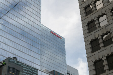 Obraz premium Scotiabank sign atop Scotiabank North Tower, Bay Adelaide Centre complex, 40 Temperance St and (detail of) Lumsden Building (1909), 113 Yonge St, Toronto