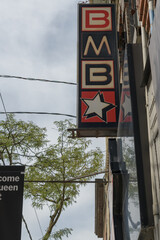 Fototapeta premium projecting wall-mounted sign outside Banh Mi Boys, a sandwich shop, located at 392 Queen St W, Toronto