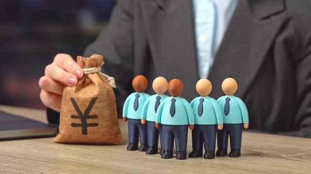 Businessman holds out a yuan or yen money bag near a group of office workers. Providing money, paying salaries and grants. Compensation payments. Staff maintenance. Financial support. Tax collection.