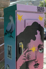 Obraz premium painted traffic control utility box featuring a retro vintage illustration of a lady at Bay St and Albert St in Toronto