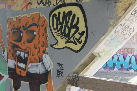 creepy, sharp-toothed SpongeBob graffiti, a local street art found along the Lower Don River Trail in Toronto