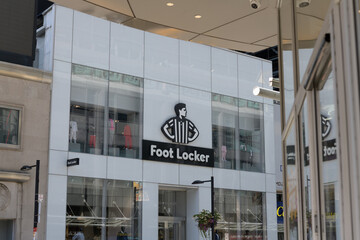 Obraz premium exterior building facade and sign of Foot Locker, a shoe store, located at 306 Yonge St, Toronto