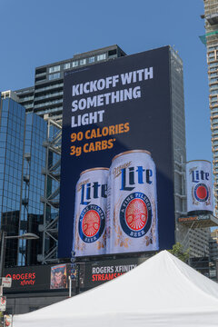 large-format rooftop digital spectacular with advertising by Miller Lite brewed by Molson Coors, Sankofa Square, Toronto