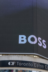 Obraz premium large-format rooftop digital spectacular with advertising by fashion house Hugo Boss, Sankofa Square, Toronto
