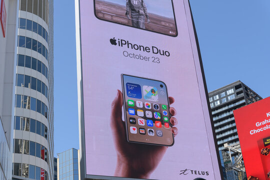 large-format rooftop digital spectacular with advertising by Apple Inc for the upcoming release of the iPhone Duo at Toronto's Sankofa Square