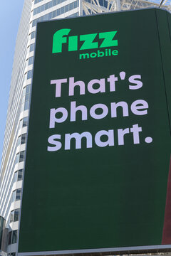digital spectacular featuring advertisement by Fizz Mobile (Freedom Mobile) facing Sankofa Square, Toronto