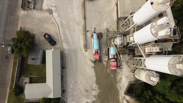 Aerial view of a concrete plant with cement trucks waiting to be filled in Raleigh, North Carolina