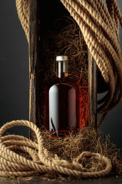 Bottle of whiskey in an old wooden crate.