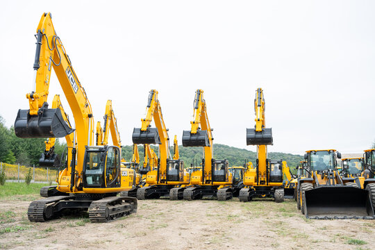 09.11.2026 - Lviv, Ukraine: JCB construction machinery displayed at a construction equipment exhibition, showcasing heavy machinery, excavators and industrial equipment