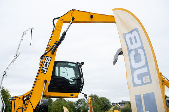 09.11.2026 - Lviv, Ukraine: JCB construction machinery displayed at a construction equipment exhibition, showcasing heavy machinery, excavators and industrial equipment