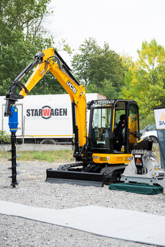 09.11.2026 - Lviv, Ukraine: JCB construction machinery displayed at a construction equipment exhibition, showcasing heavy machinery, excavators and industrial equipment