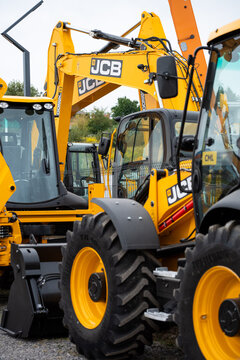 09.11.2026 - Lviv, Ukraine: JCB construction machinery displayed at a construction equipment exhibition, showcasing heavy machinery, excavators and industrial equipment