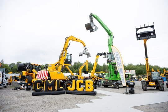 09.11.2026 - Lviv, Ukraine: JCB construction machinery displayed at a construction equipment exhibition, showcasing heavy machinery, excavators and industrial equipment