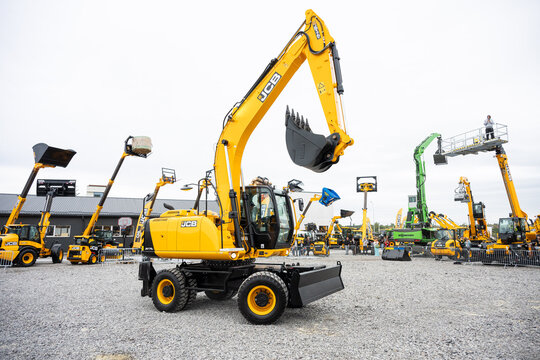 09.11.2026 - Lviv, Ukraine: JCB construction machinery displayed at a construction equipment exhibition, showcasing heavy machinery, excavators and industrial equipment
