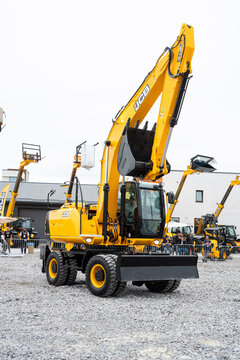 09.11.2026 - Lviv, Ukraine: JCB construction machinery displayed at a construction equipment exhibition, showcasing heavy machinery, excavators and industrial equipment 
