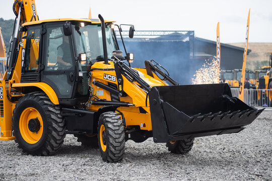 09.11.2026 - Lviv, Ukraine: JCB construction machinery displayed at a construction equipment exhibition, showcasing heavy machinery, excavators and industrial equipment 