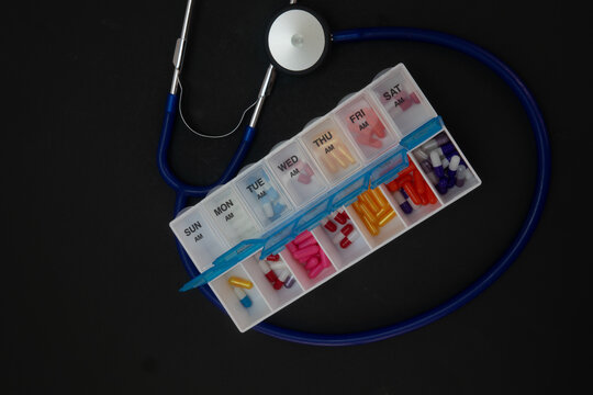Stethoscope and Pill Organizer Symbolizing Health Care