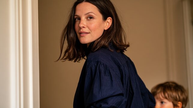 Portrait of a Woman in Casual Attire, Looking to the Side with Slight Smile