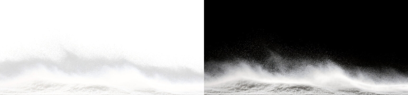 Snowdrift with blowing snow powder overlay on transparent and black background. Winter blizzard and flying ice crystals effect