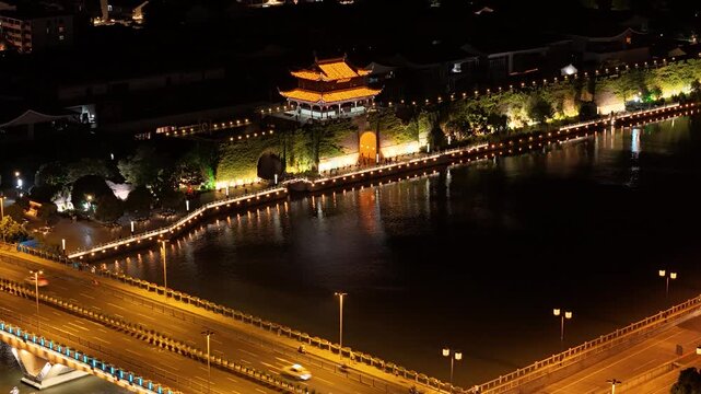 Illuminated Ancient City Wall and Moat at Night in Xi'an, China