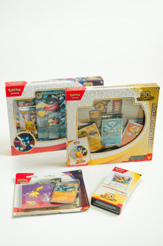 Chicago, IL/USA - September 16, 2026: Multiple Pok&eacute;mon Trading Card Game products are arranged together in special 30th anniversary packaging, including collector boxes, promo cards, and stickers