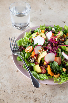 pixbae fruit (Peach palm) salad with lettuce, avocado, olives, pistachio, radicches.