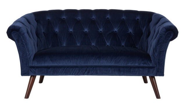 Deep blue velvet tufted sofa with curved arms, isolated on transparent background