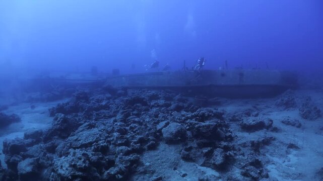 shipwreck scenery underwater ship wreck deep blue water ocean scenery of metal underwater scuba divers to explore