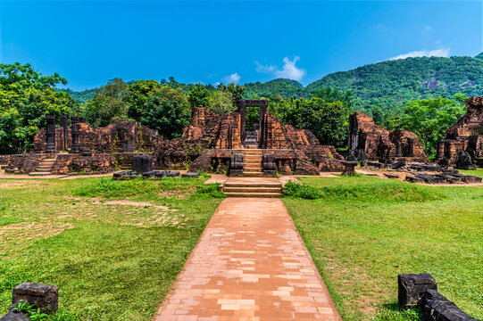 A view across a collection of Hindu temple ruins at the My Sơn Sanctuary in Quang Nam Province, Vietnam on a bright sunny day