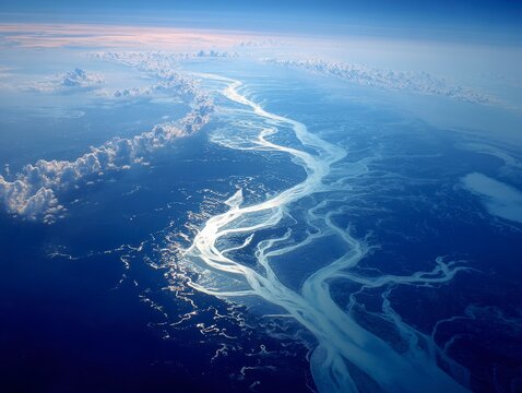 Serene Aerial View of River Meandering Through Blue Ocean Waters