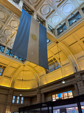 Argentinian flag hanging inside the Retiro Station hall in Buenos Aires