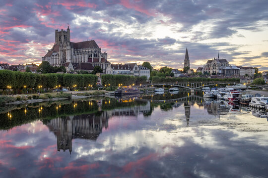 Auxerre city and the Yonne river at sunset - France
