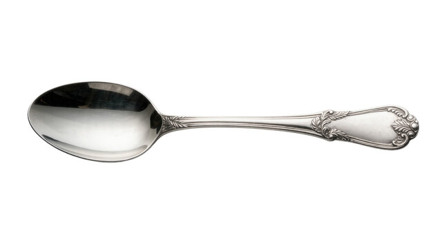 Ornate silver spoon with decorative handle, isolated on transparent background