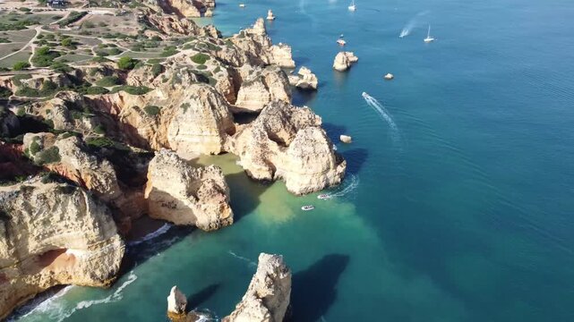 Aerial view of Ponta da Piedade cliffs and turquoise Atlantic Ocean