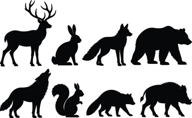 Fototapeta premium Set of black forest animal silhouettes including deer bear fox and wolf vector illustration