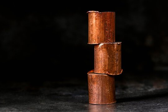 Minimalist industrial composition copper cylinders as raw material for the non-ferrous metals industry