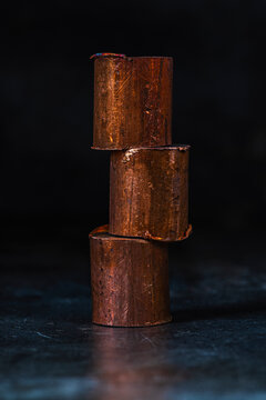 Minimalist industrial composition copper cylinders as raw material for the non-ferrous metals industry
