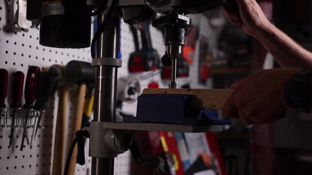 Drill press spinning up and cuts hole in piece of wood