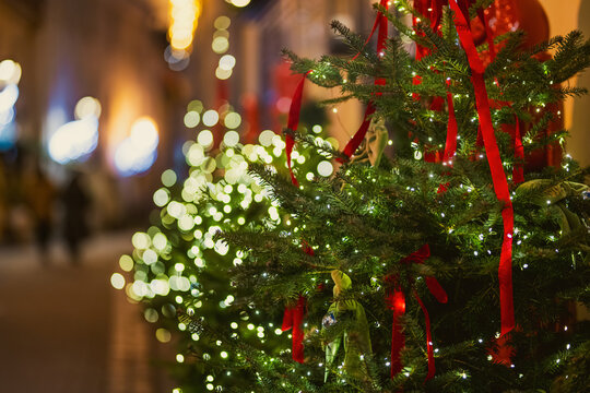 Christmas decorations and festive lights on the streets of Vilnius, Lithuania. Seasonal outdoor decor creates a warm holiday atmosphere in the city.