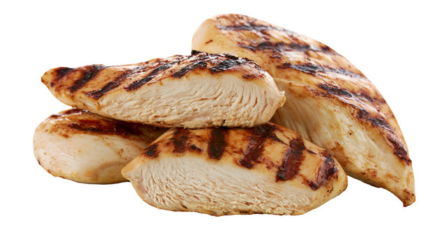 Isolated perfectly cooked grilled chicken breasts showing juicy meat and appetizing char marks