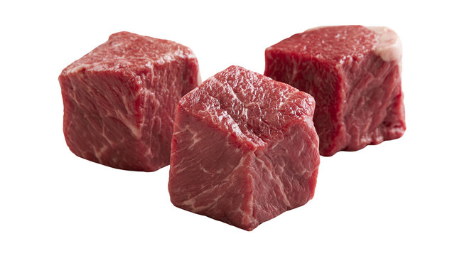 Isolated three raw beef cubes, fresh red meat for cooking and culinary preparations