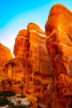Fiery Furnace sandstone fins glow under morning sunrise light