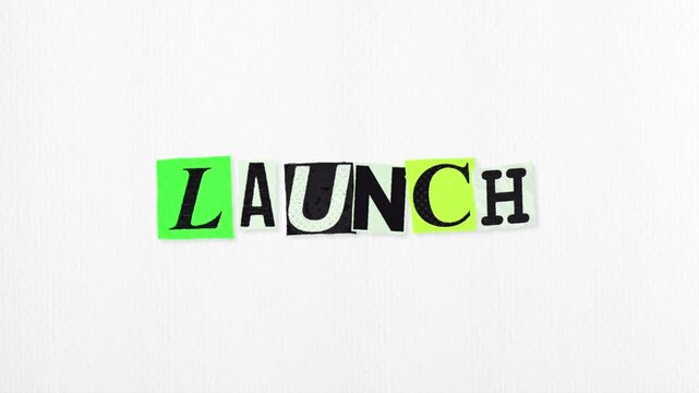 Launch cut-paper typography loop on white textured paper