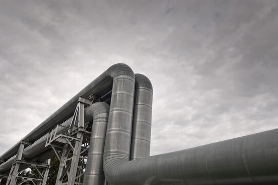 close-up of a pipeline against a gray sky