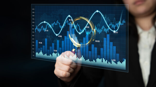 A business professional engages with transparent financial data on a digital screen, showcasing graphs and charts to illustrate market trends and growth strategies. Scalp