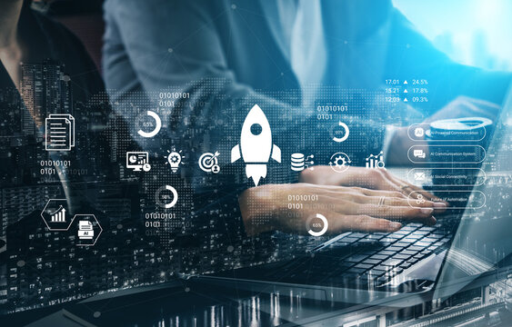 Dynamic image showing a businessman working on a laptop amidst digital graphs and a rocket icon, symbolizing innovation and new beginnings in a tech-savvy environment. Nascent